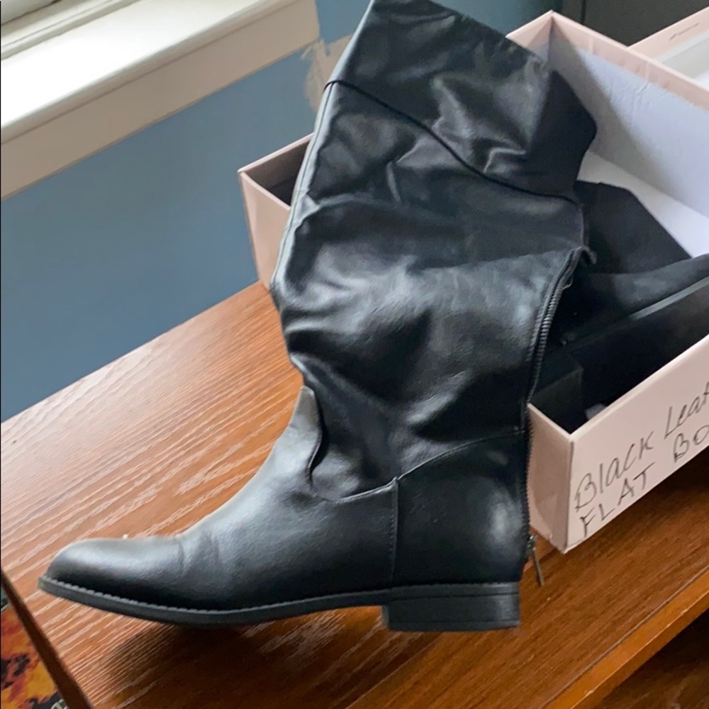 Thigh high black flat boots